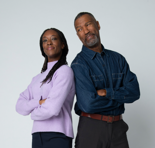 Man and woman smiling arms crossed